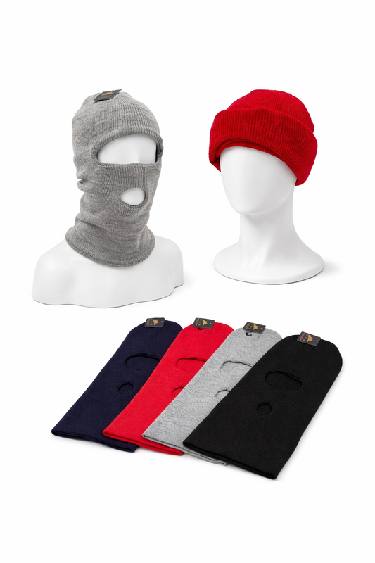 Gray, red, and black ski masks on mannequin heads with additional masks stacked below.