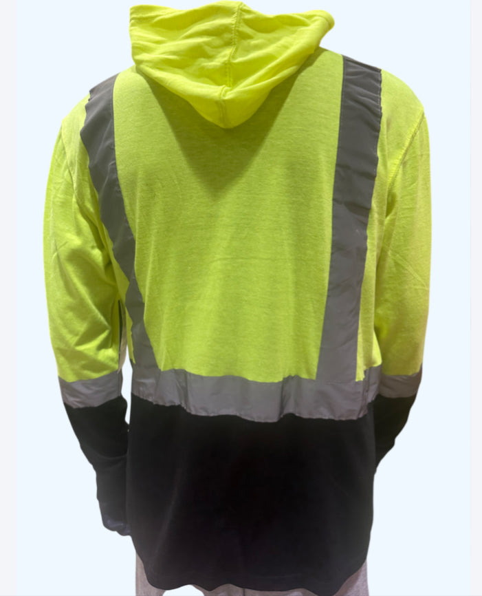Yellow safety jacket with reflective stripes on a white background