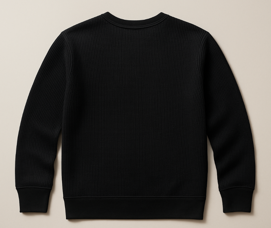 Black textured sweatshirt on a beige background