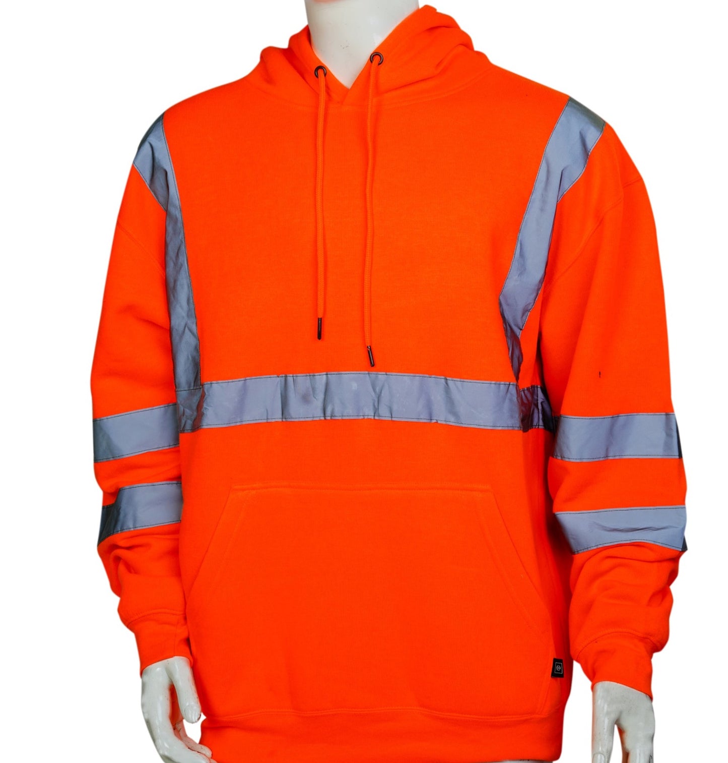 A person wearing an orange safety hoodie with reflective silver stripes on the chest, shoulders, and sleeves.