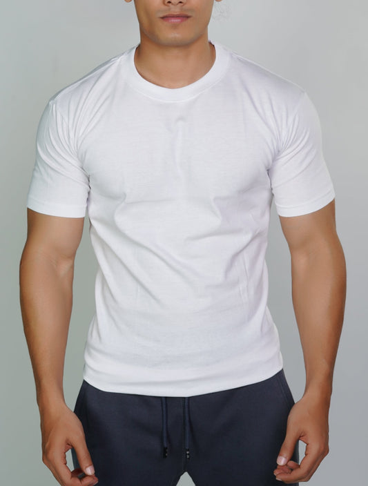 A male model wearing a white crewneck t-shirt.