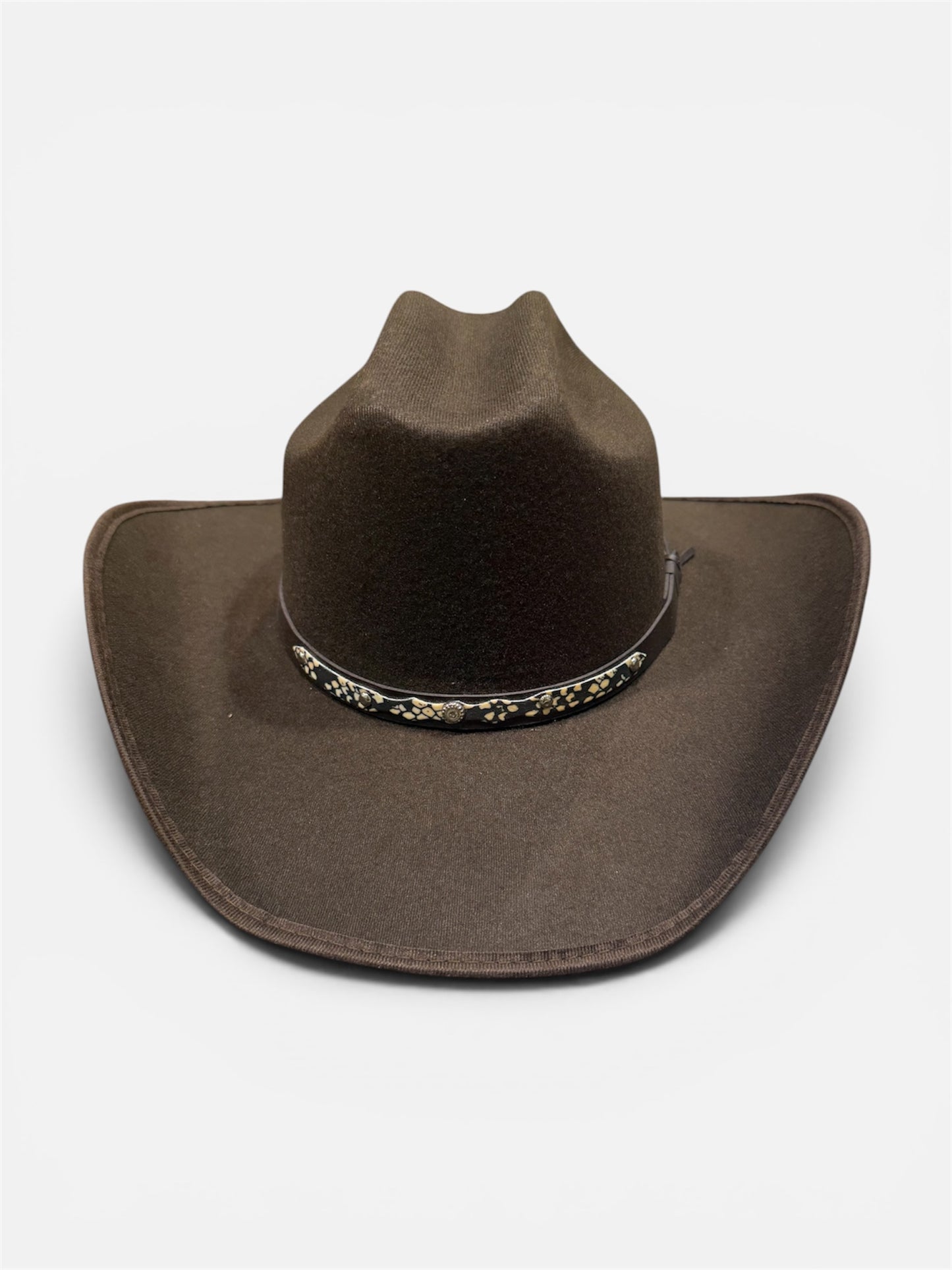 Brown cowboy hat with decorative band on a white background