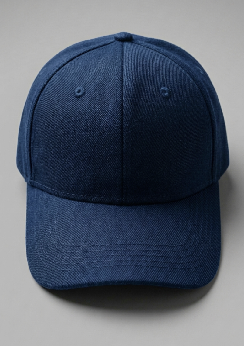 Navy blue baseball cap on a gray background