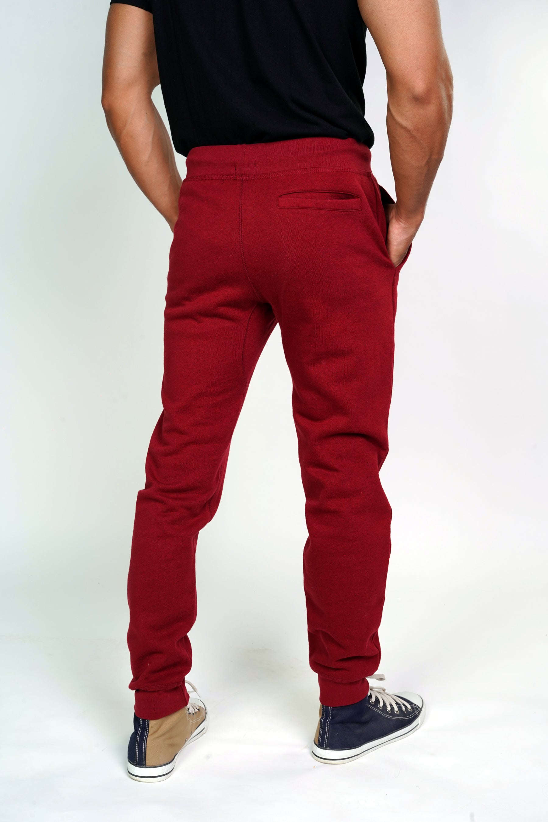 back of red color jogger pants