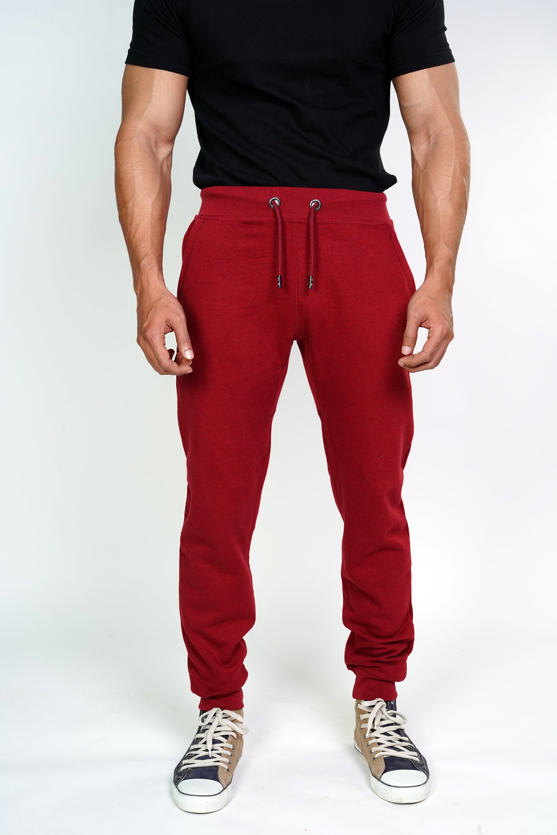 front of red colored jogger pants